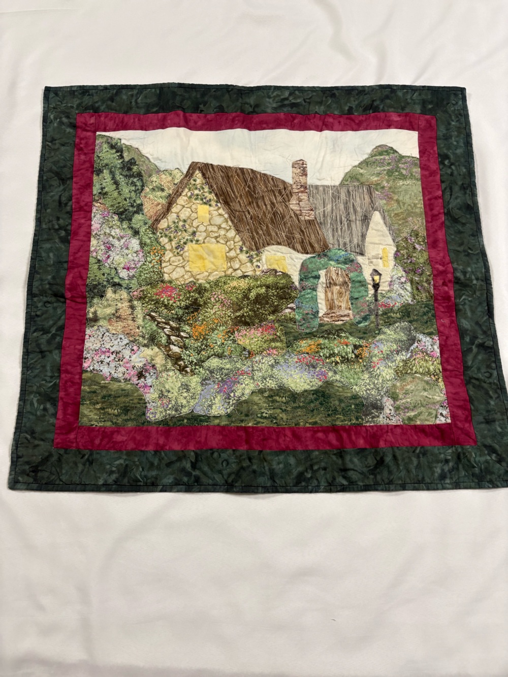 Handmade quilted cottage scene table topper or wall hanging